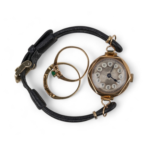 59 - Early 20th centuryA nine carat gold ladies' wristwatch.The silver dial with black and white numerals... 