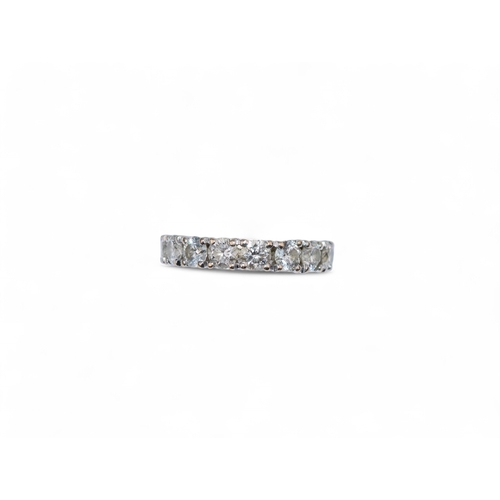 69 - 1990sA fine brilliant cut diamond and 18 k gold hoop ring. Set with sixteen brilliant cut diamonds. ... 