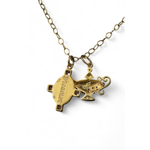 75 - ContinentalTwo yellow gold and diamond Aladdin-themed pendants.Weight:Approx. 14.94 g.... 