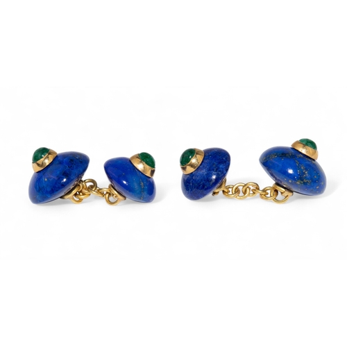 81 - A pair of lapis lazuli gold and emerald cufflinks.