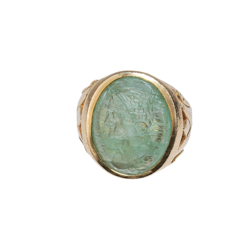 84 - Ancient (?)An emerald intaglio, possibly of the Emperor Vespasian, within a heavy 14 k yellow gold s... 