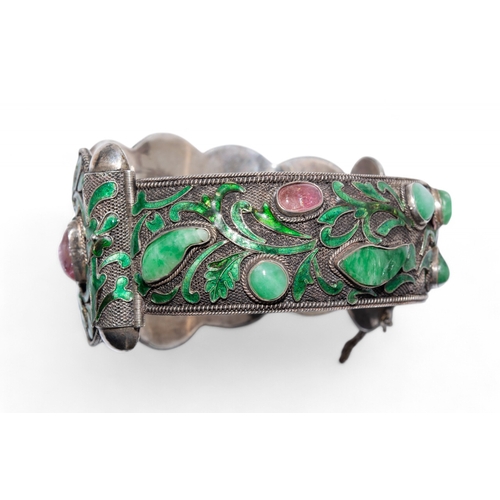 9 - Chinese, late 19th centuryA jade, gem set and enamel silver filigree bangle and a silver gilt and fi... 