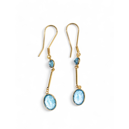 94 - ContemporaryA pair of blue topaz two-stone pendant earrings.Weight: Approx. 1.46 g.... 