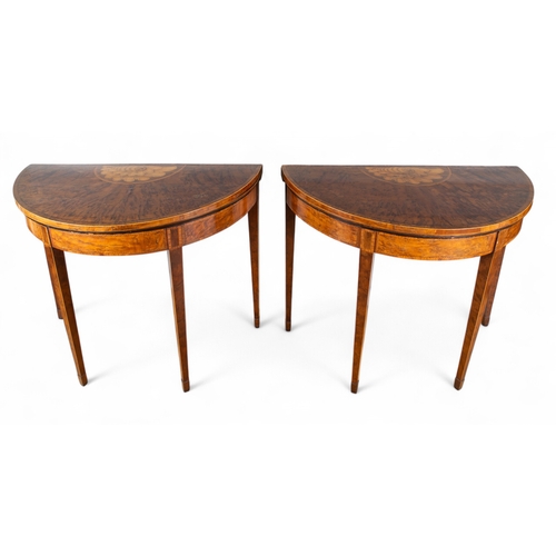 198 - George IIIA pair of demi-lune burr yew gaming tables, with central fruitwood marquetry inlay depicti... 