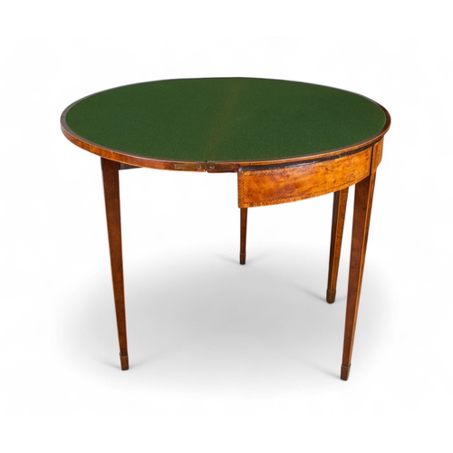 198 - George IIIA pair of demi-lune burr yew gaming tables, with central fruitwood marquetry inlay depicti... 