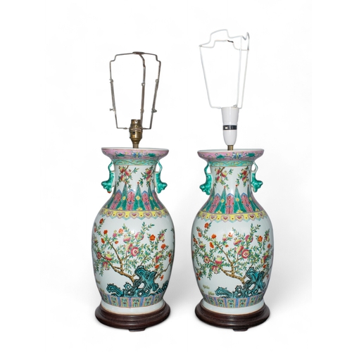 206 - Chinese20th centuryA pair of famille rose baluster vases converted to table lampsProvenance:Margaret... 