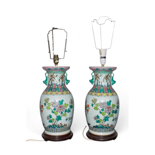 206 - Chinese20th centuryA pair of famille rose baluster vases converted to table lampsProvenance:Margaret... 