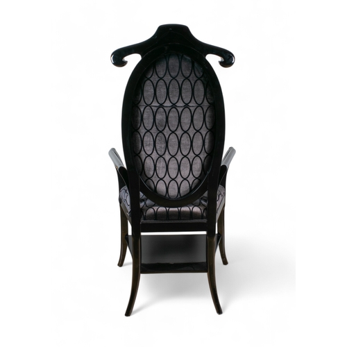 242 - ContemporaryA large black chair with coat-hanger backTo be sold without reserveDimensions:50.5 in. (... 