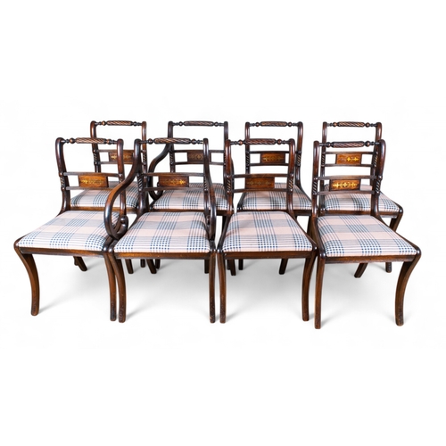 256 - RegencyA set of eight rope-twist dining chairs with brass inlay, including two carversProperty of a ... 