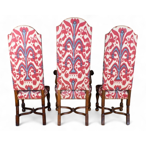 260 - Early 20th century, Carolean styleA set of 12 high-back dining chairs, including two carvers, with c... 