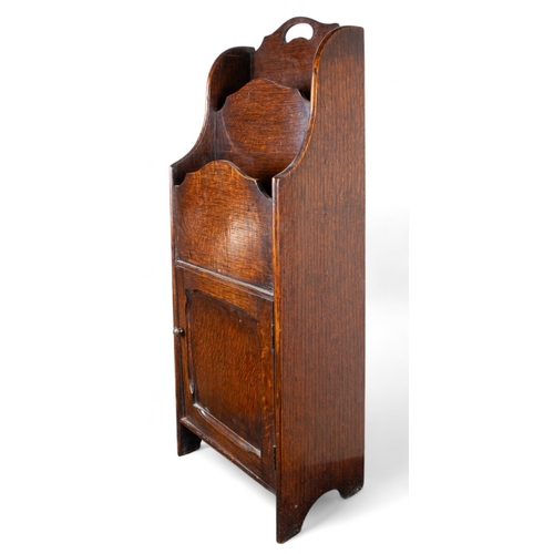 267 - British, 20th CenturyA mahogany magazine rack, with a bottom doorProperty of a gentlemanFrom the Pet... 