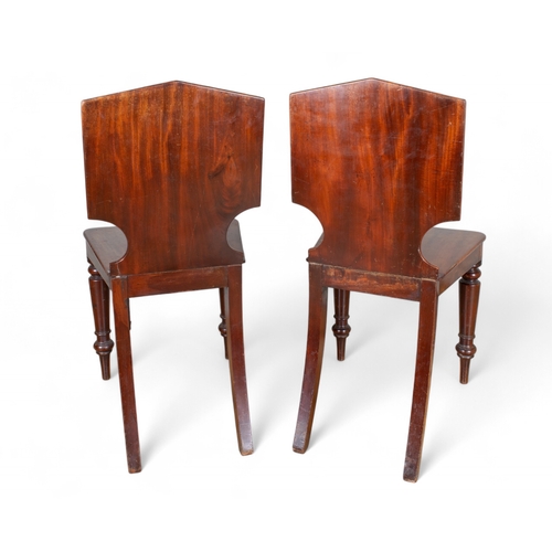 291 - GeorgianA pair of mahogany hall chairsDimensions:33 in. (H) x 16.5 in. (W) x 15 in. (D)... 