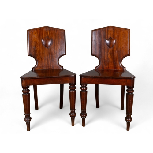 291 - GeorgianA pair of mahogany hall chairsDimensions:33 in. (H) x 16.5 in. (W) x 15 in. (D)... 