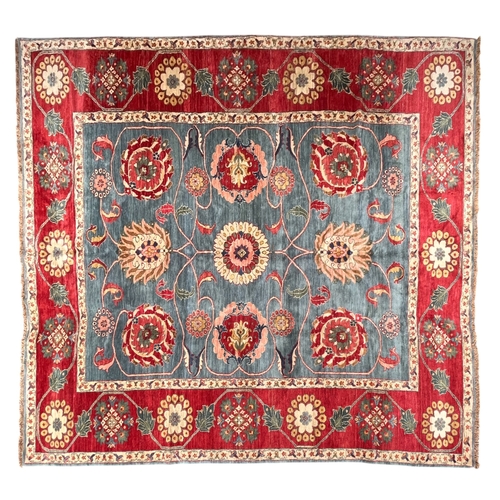 330 - Circa 1980An Agra carpet in blues and redsDimensions:493 cm (L) x 357 cm (W)... 