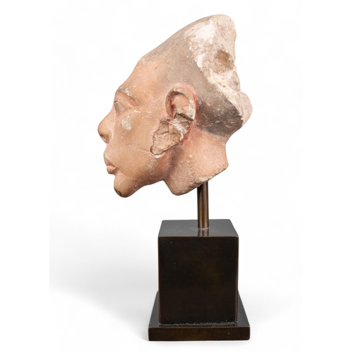 553 - Egyptian, Armana (?)a head with side-lock of youthProvenance:Private collection, UKDimensions:11 in.... 