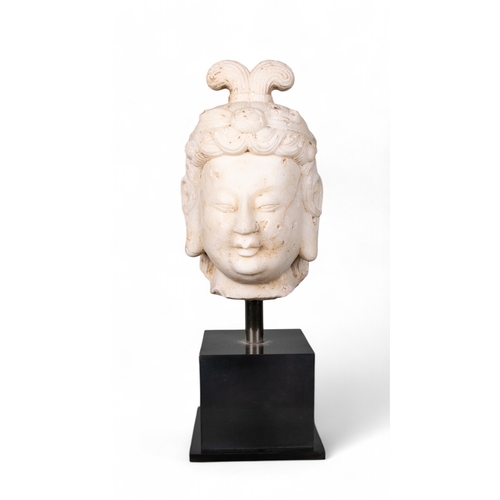 510 - Chinese, 8th centuryA rare Tang Dynasty (?) white marble head of Kuan Yin.Dimensions:(Excl. base) 9 ... 