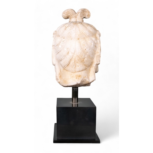 510 - Chinese, 8th centuryA rare Tang Dynasty (?) white marble head of Kuan Yin.Dimensions:(Excl. base) 9 ... 