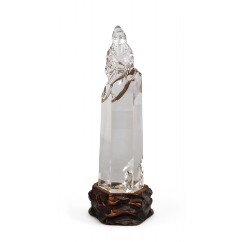 540 - Chinese, 19th centuryA very pure rock crystal Kuan Yin seated on a pure rock crystal plinth. On a la... 