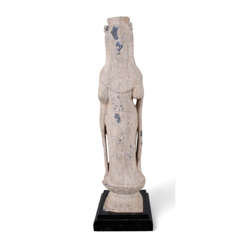 543 - Chinese, 7th/8th centuryA carved grey marble standing Tang Dynasty figure of a lady with headdress o... 