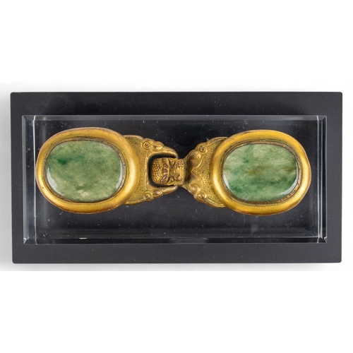 548 - Chinese, Ming dynastyA gilt bronze and jadeite belt buckle, skilfully cast of large size. With a dra... 