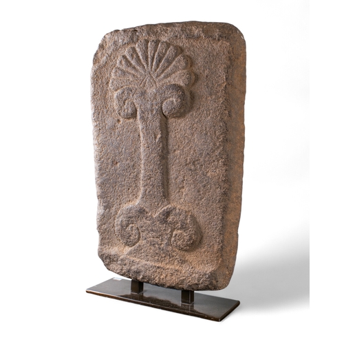 551 - Near Eastern, 10th-9th century BCStela of a palm treeBasalt on a metal baseProvenance:Acquired by th... 