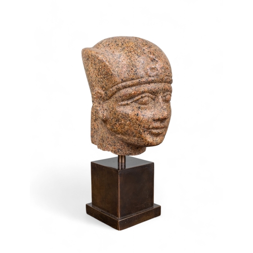 554 - Egyptian (?)A granite head of Pharaoh, with frontal uraeusDimensions:8 in. (H)... 