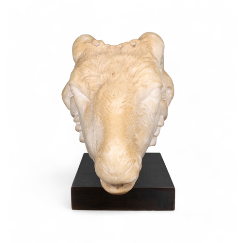 559 - NeoclassicalA finely carved ram's headMarble and mountedDimensions:11 in. (H) x 11.5 in. (L)... 