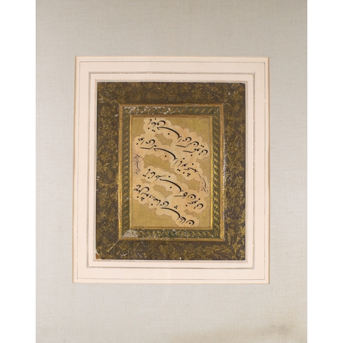 587 - A nasta'liq calligraphic panelSigned by Abd al Rahim Adrian QalamWith a decorated gold borderFramed ... 