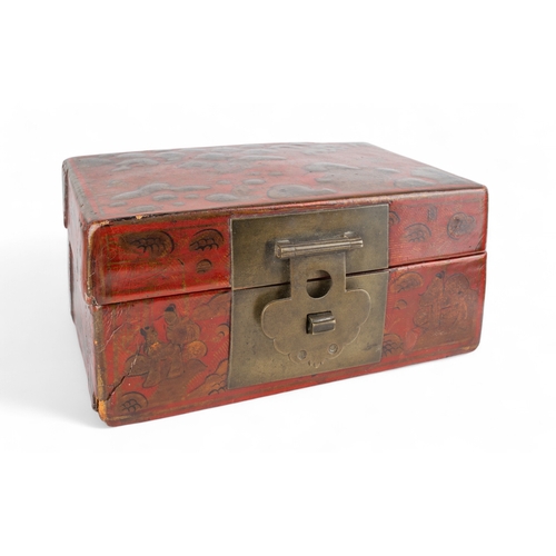 675 - A mixed lot of Japanese itemsTo include:[a] An early 20th century red lacquer papier maché bo... 