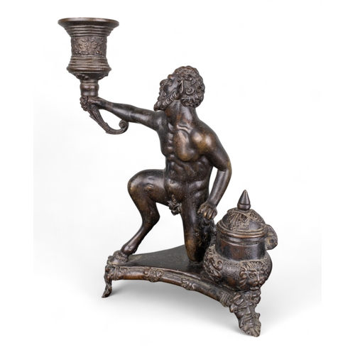 683 - Italian16th century and laterA bronze inkstand in the form of a kneeling satyr holding a torch. The ... 