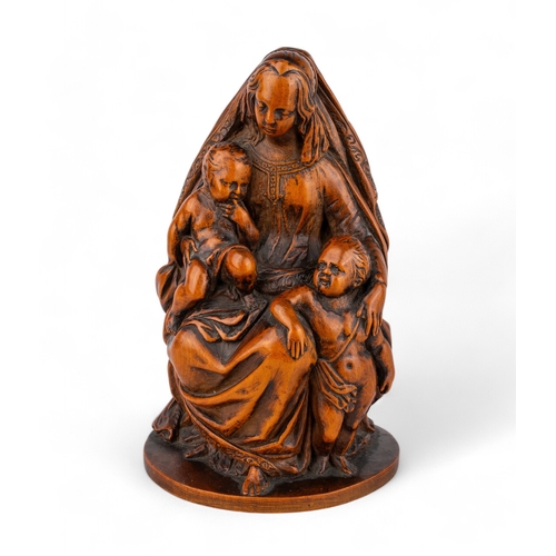 688 - German (?)18th century, possibly late 17thA boxwood carved figure of the Virgin with the infant Chri... 