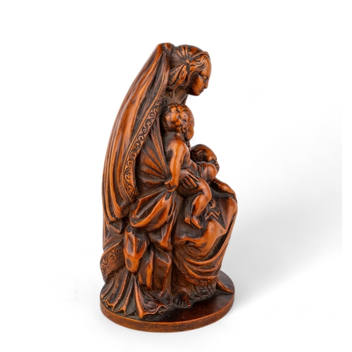 688 - German (?)18th century, possibly late 17thA boxwood carved figure of the Virgin with the infant Chri... 