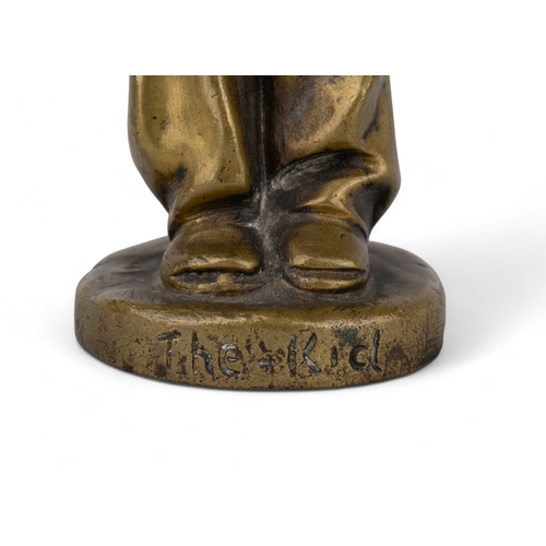 704 - Jean Verschneider (French, 1872-1943)The KidBronze and ivoryInscribed 'The Kid' and signed '62 J. Ve... 