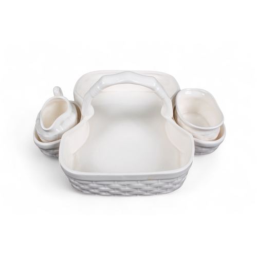 716 - 20th century, Tiffany & Co.A white porcelain three-piece strawberry set, to include a dish and a... 