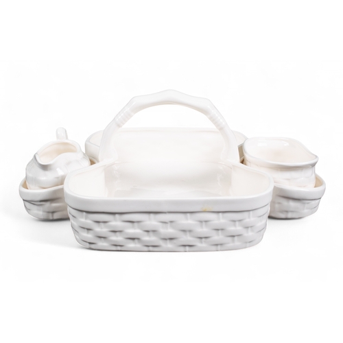 716 - 20th century, Tiffany & Co.A white porcelain three-piece strawberry set, to include a dish and a... 