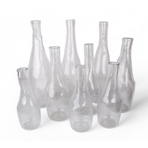 723 - Michael Ruh (British, Contemporary), A collection of nine hand-blown glass vases2002Signed and dated... 