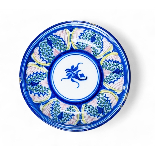 736 - Italian, 19th centuryA mixed lot of majolica bowlsTo include:[a] Three large blue and white dishes, ... 