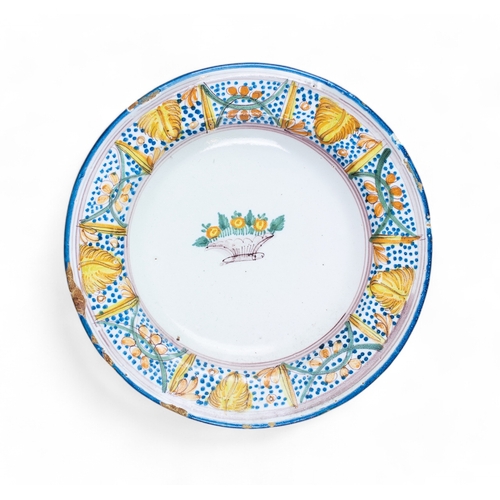 736 - Italian, 19th centuryA mixed lot of majolica bowlsTo include:[a] Three large blue and white dishes, ... 