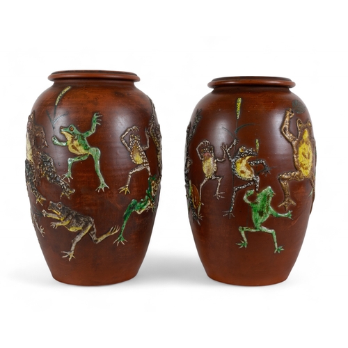 739 - Japanesec. 1900A pair of terracotta vases with appliqué overglaze dancing frogsWith marks und... 