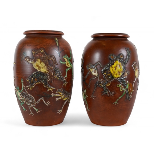 739 - Japanesec. 1900A pair of terracotta vases with appliqué overglaze dancing frogsWith marks und... 