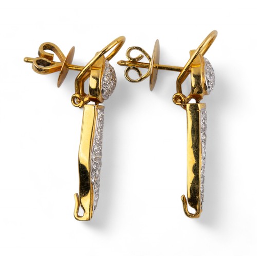 108 - ContemporaryA pair of diamond and yellow metal pendant torch earringsWeight: Approx. 8.46 g.... 