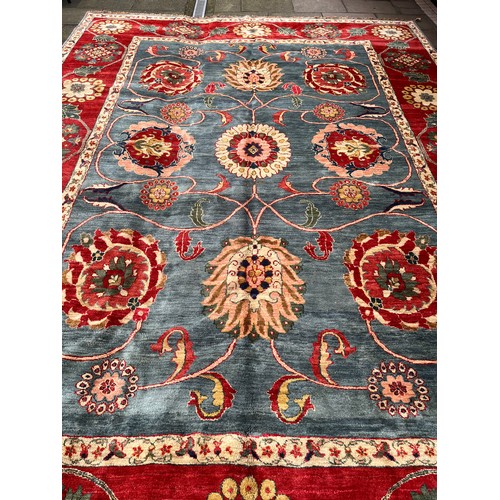 330 - Circa 1980An Agra carpet in blues and redsDimensions:493 cm (L) x 357 cm (W)... 