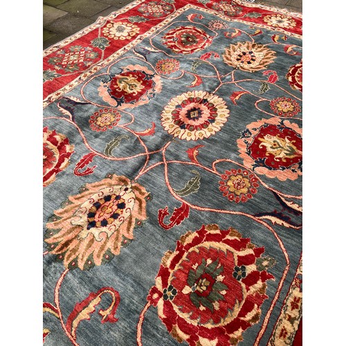 330 - Circa 1980An Agra carpet in blues and redsDimensions:493 cm (L) x 357 cm (W)... 