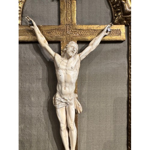 707 - Italian or German17th centuryAn ivory crucifixThe figure of Christ and banner with ‘INRI’ in ivory, ... 