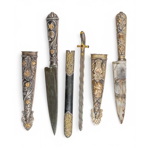 133 - A group of five various daggers and a glass axeTo include:[a] Early 20th century, A cloisonné... 