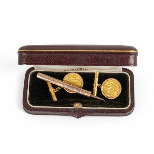 144 - A mixed lotTogether with: [a] A pair of Islamic gold coin cufflinks[b] A gold toothpick[c] An&n... 