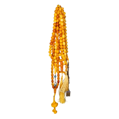 95 - A group of six butterscotch amber and amber prayer bead necklacesProperty of a noblemanTotal weight:... 