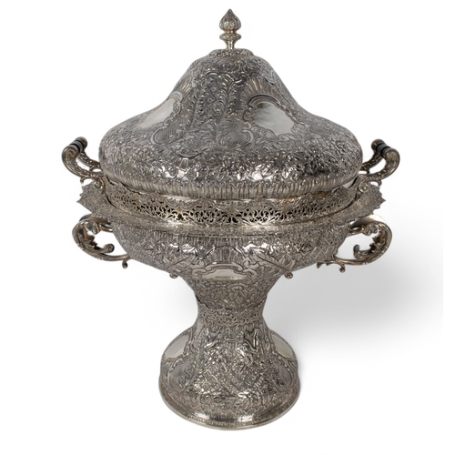 169 - A Large Turkish Sterling silver repoussé decorated tagine and cover on a pedestal footHallmar... 