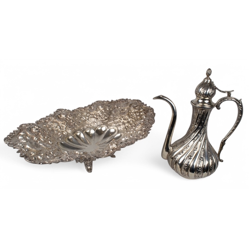 179 - OttomanA silver repoussé tazza on four legs together with a silver rose water ewerBoth hallma... 