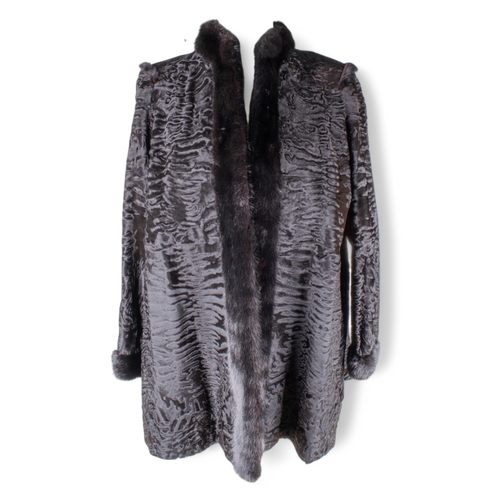 201 - Sistovari, GeneveA 1970s astrakhan lamb skin and black mink coat